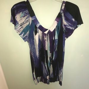 Multi-colored shirt.